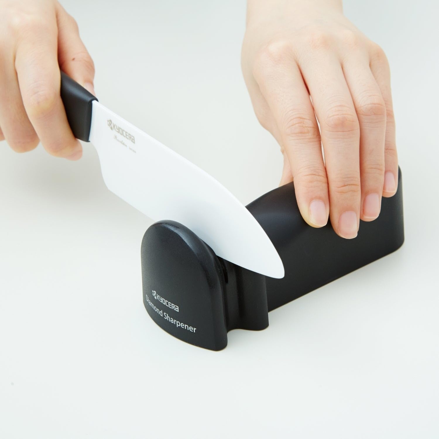 image:imageKyocera Advanced Ceramics Diamond Wheel Knife Sharpener for Ceramic and Steel Knives KYOCERA Manual Knife Sharpener Durable Diamond 1000 Grit Wheel for Precise Ceramic amp Steel Blade Maintenance1