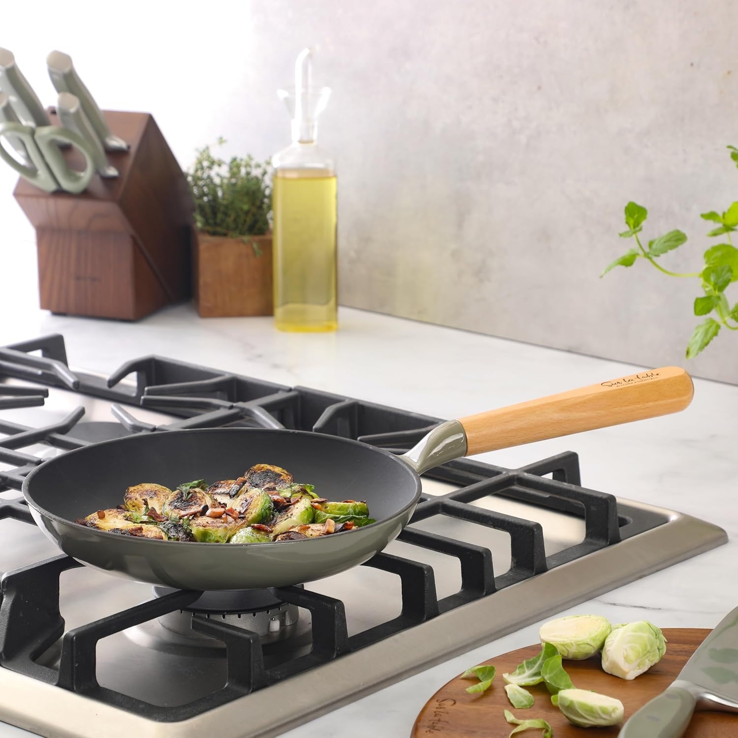 image:imageSur La Table Kitchen Essential Main Canteen 95 PreSeasoned Cast Iron Skillet wWood Handle Natural Nonstick Lightweight Frying Pan for Searing Sauting amp Everyday Cooking Juniper GreenJuniper Green Skillet