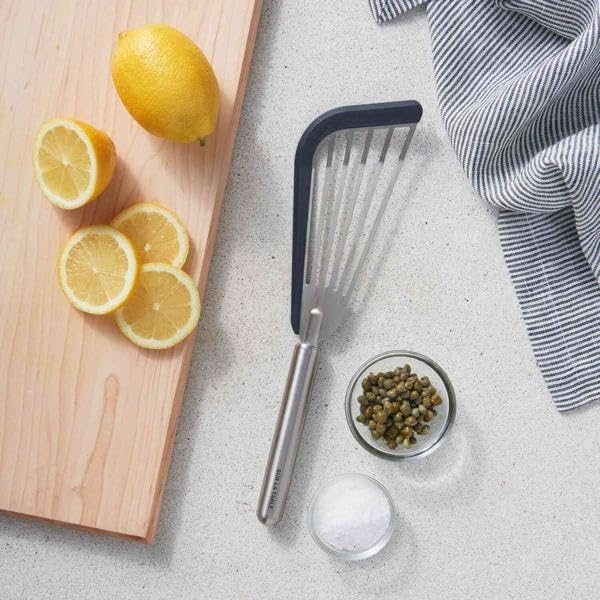 image:imageSur La Table Stainless Steel Fish Turner with Silicone Tip Nonstick HeatResistant Flexible Spatula for Delicate Foods Ergonomic Handle DishwasherBlack