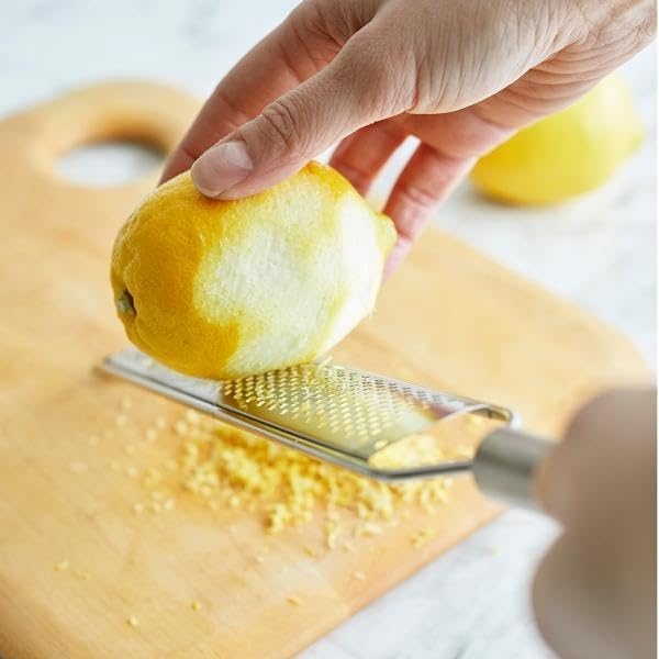 image:imageSur La Table Stainless Steel Rasp Grater Fine Rasp Grater for Zesting Citrus Grating Hard Cheese and Microplaning Spices