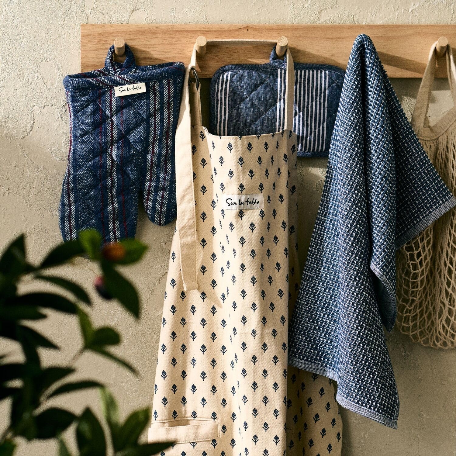image:imageSur La Table Tulip Apron Blue FullCoverage Cotton Apron with Embroidered Tulip Design and Adjustable Neck Strap
